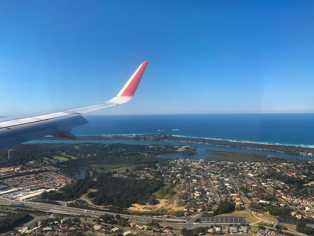 View from passenger plane window behind wing